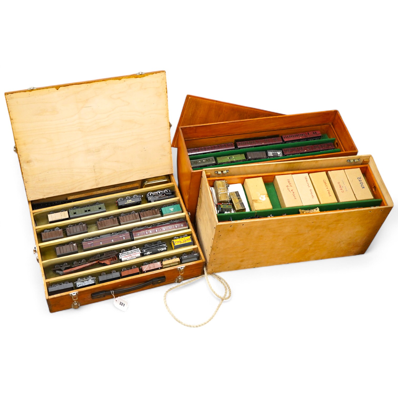 130 items of EM gauge model railway rolling stock contained within three handmade fitted wooden cases, two with removable trays, comprising three locomotives; an SR class 700 0-6-0 tender locomotive, 693, an SR 0-4-0T, 7